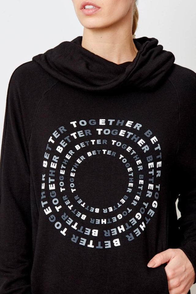 black cowl neck sweatshirt with "better together" graphic of 4 grading circles is printed on the front in alternating ink colors of white, light grey, and dark grey