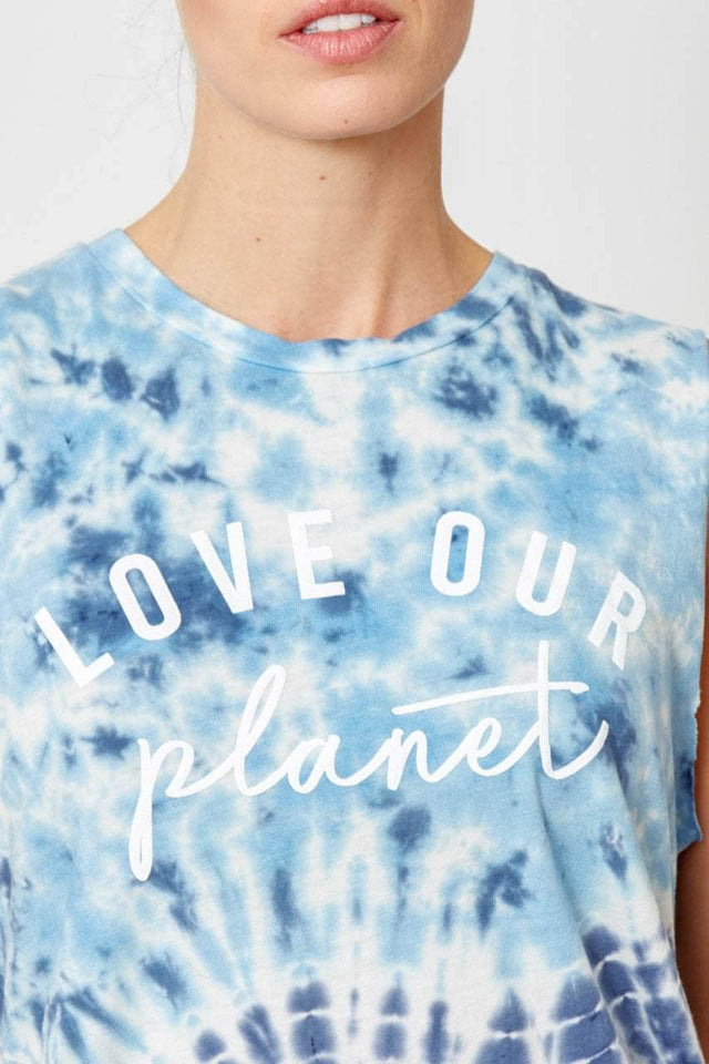 light and dark blue tie dye cropped, crew neck tank top with raw edge sleeves 