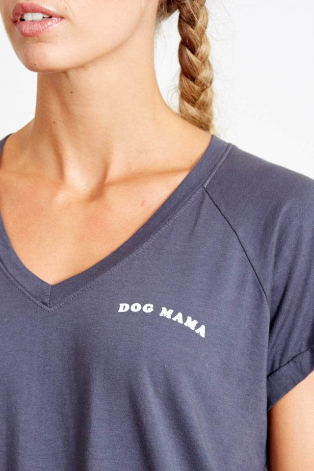 navy blue v neck t shirt with a relaxed fit, and "dog mama" message printed in white on the left side of the chest.